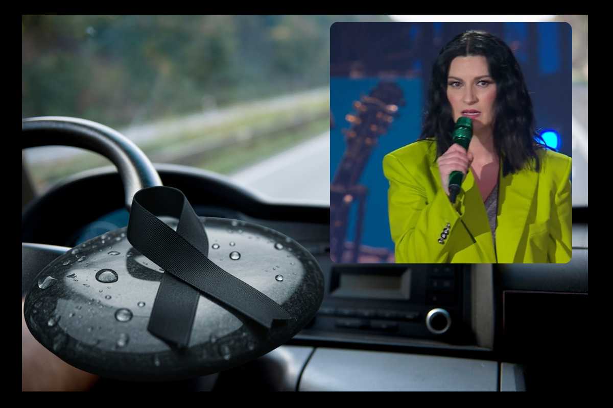 Un'auto, un segno di lutto e nel riquadro Laura Pausini